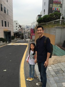Every morning Yoon walks to school with her father.